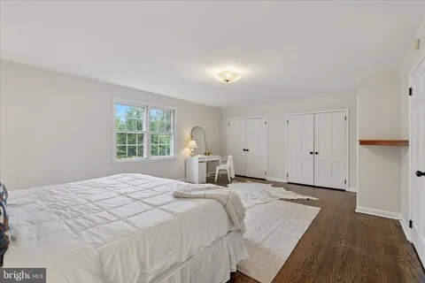 front view of a house with a garden