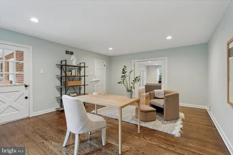 a kitchen with stainless steel appliances granite countertop a stove and cabinets