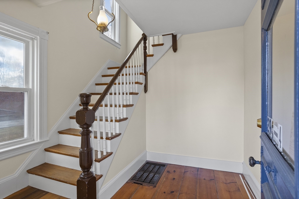 294 Great Road, Unit 2 Littleton, MA 01460 - Photo 3 of 18 a view of entryway with wooden floor