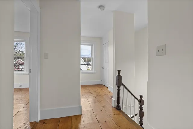 a view of a hallway with entryway