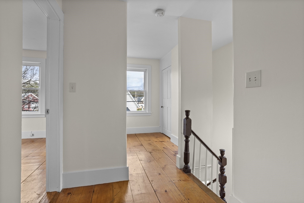 294 Great Road, Unit 2 Littleton, MA 01460 - Photo 4 of 18 a view of a hallway with entryway