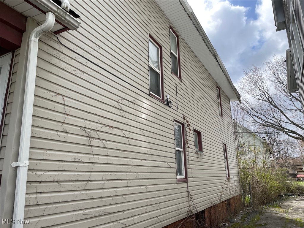 13428 Hartford Road Cleveland, OH 44112 - Photo 2 of 33 Westside of the house