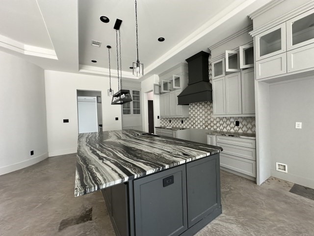 875 Lonestar Road Huntsville, TX 77340 - Photo 11 of 24 a kitchen with stainless steel appliances granite countertop a stove a sink and a refrigerator