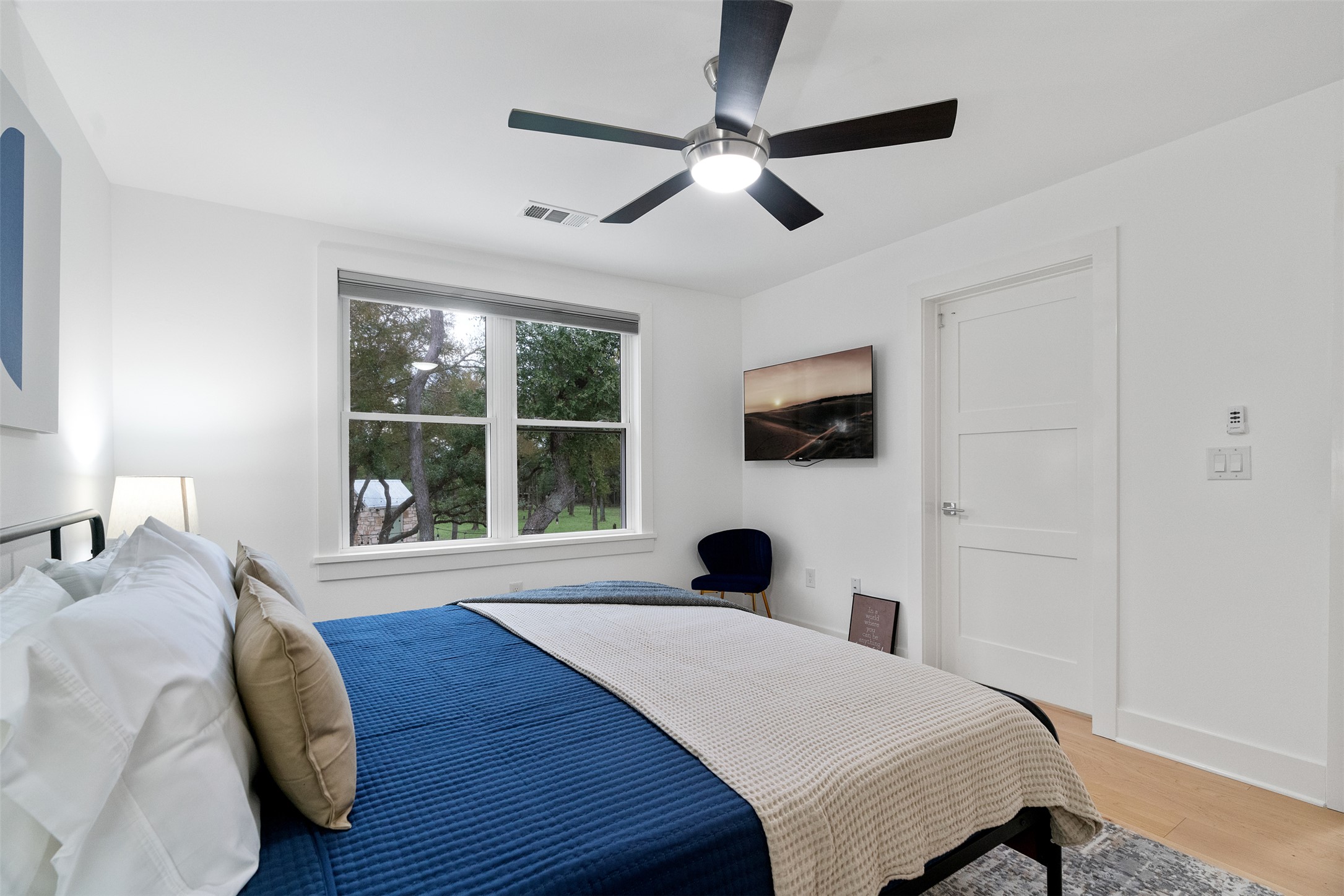 1100 Live Oak Road Leander, TX 78641 - Photo 29 of 40 a bedroom with a bed and a window