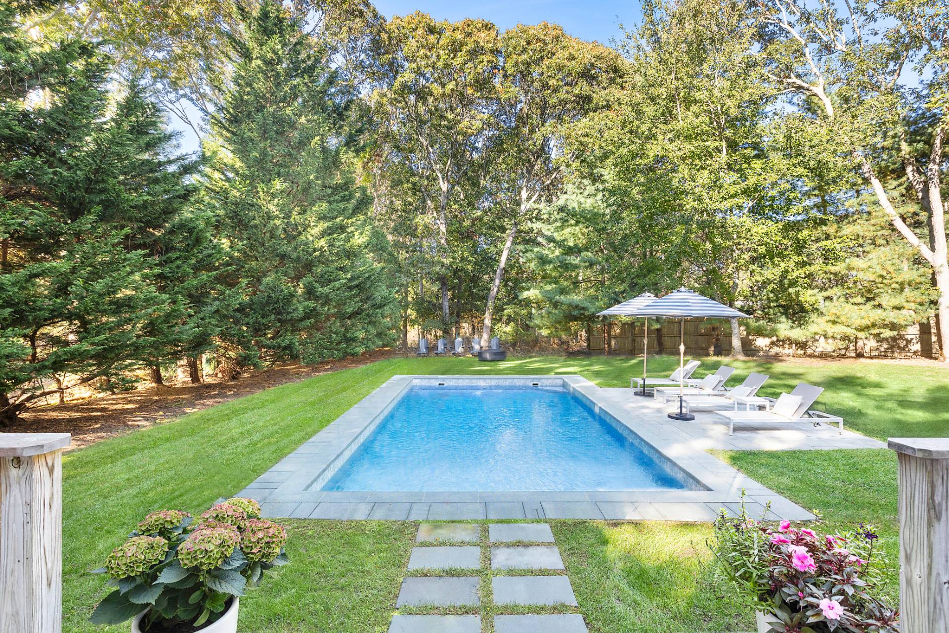 a view of a backyard with a patio