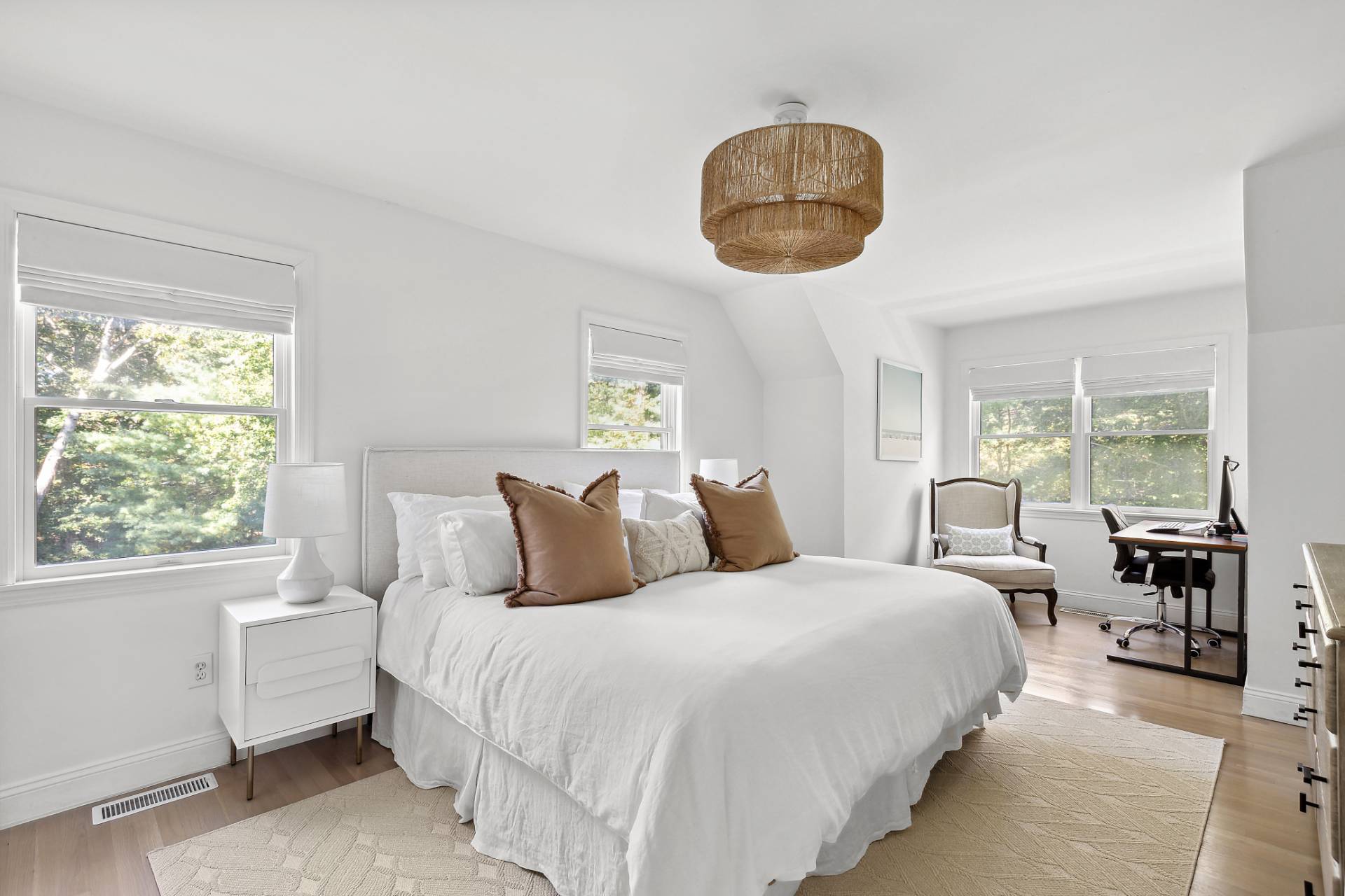 32 Old Fish Cove Road Southampton, NY 11968 - Photo 15 of 23 a bedroom with a large bed and a large window