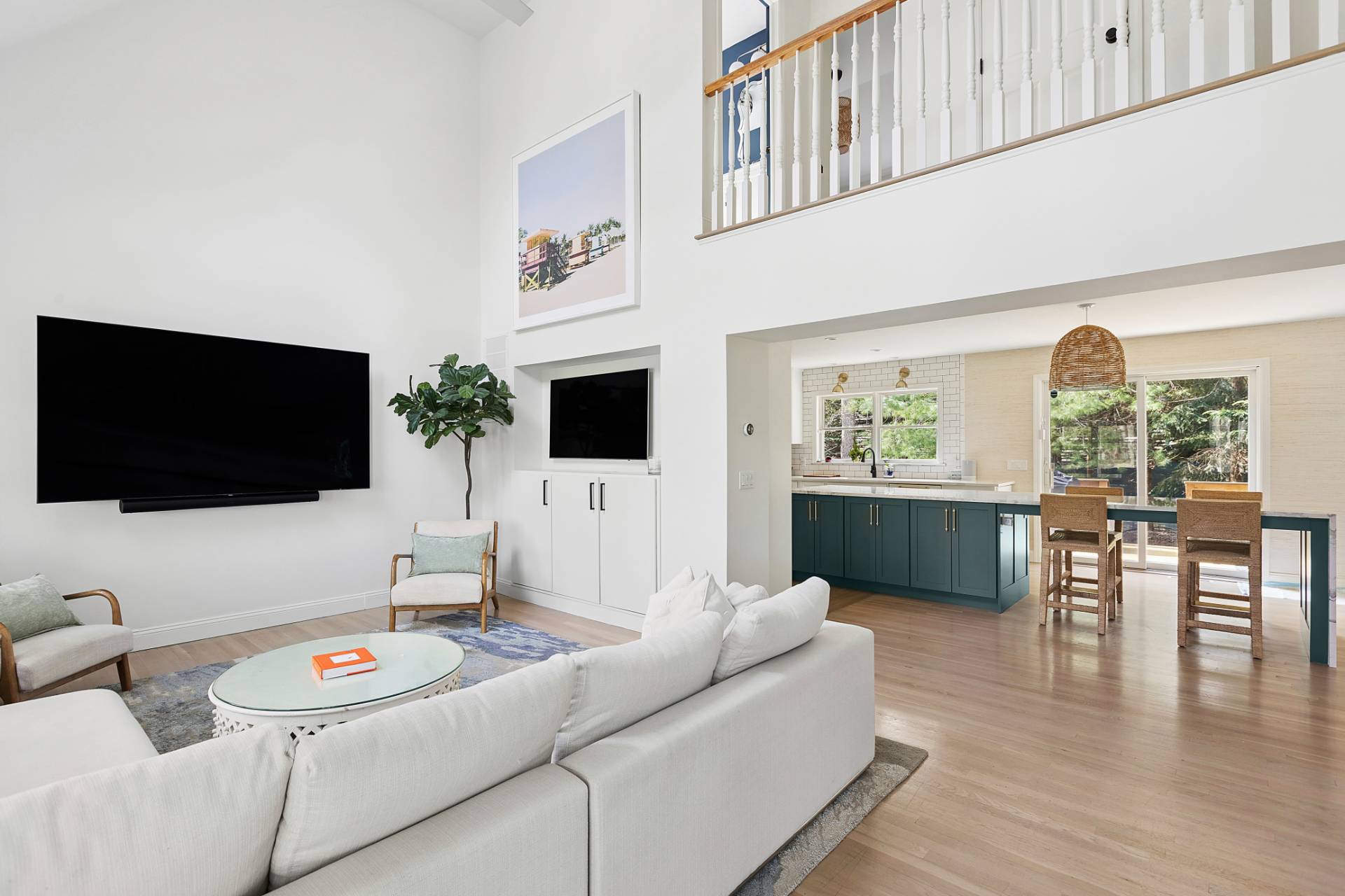 32 Old Fish Cove Road Southampton, NY 11968 - Photo 5 of 23 a living room with furniture and a flat screen tv