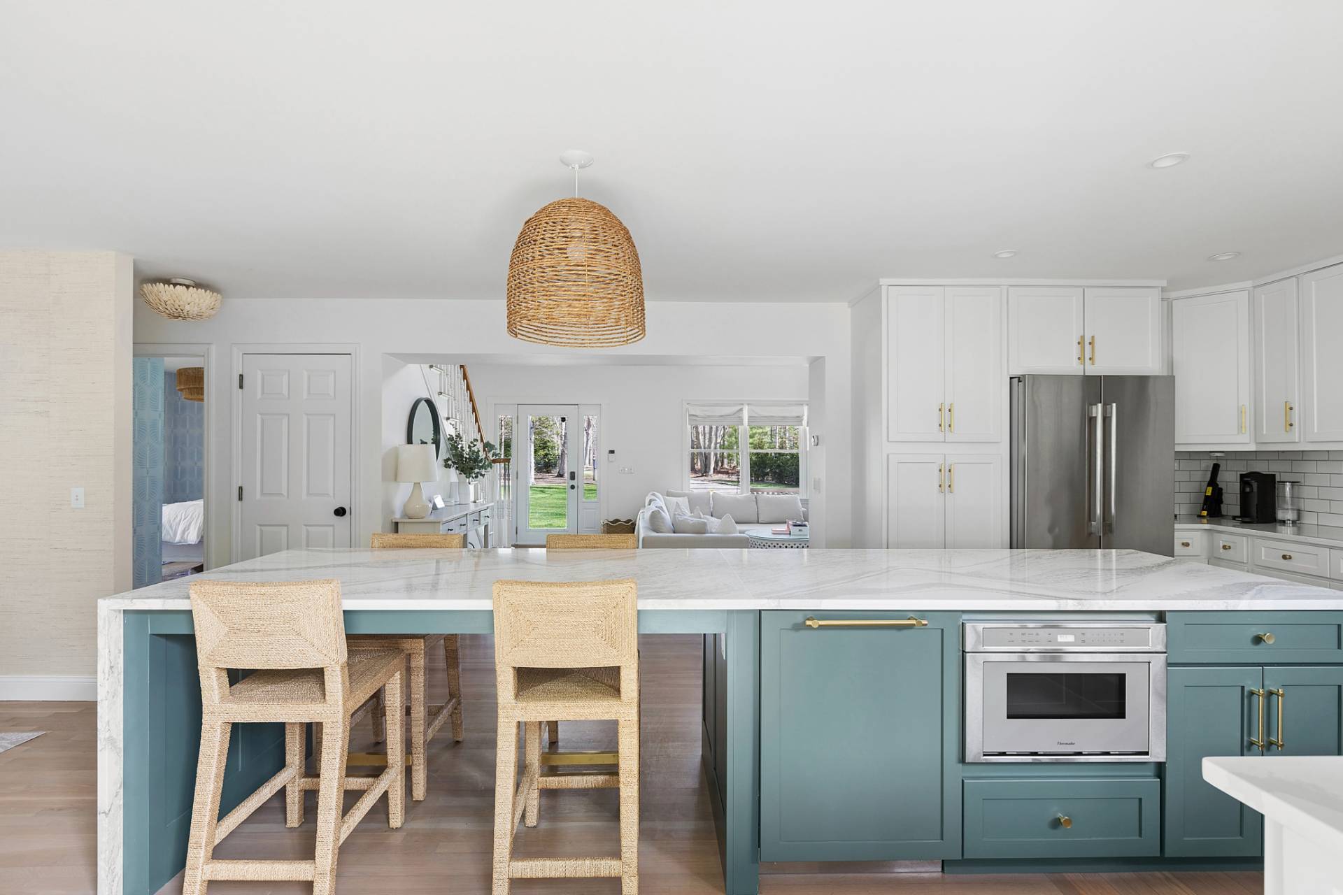 32 Old Fish Cove Road Southampton, NY 11968 - Photo 10 of 23 a kitchen with stainless steel appliances granite countertop a kitchen island a stove a cabinets a sink and a refrigerator