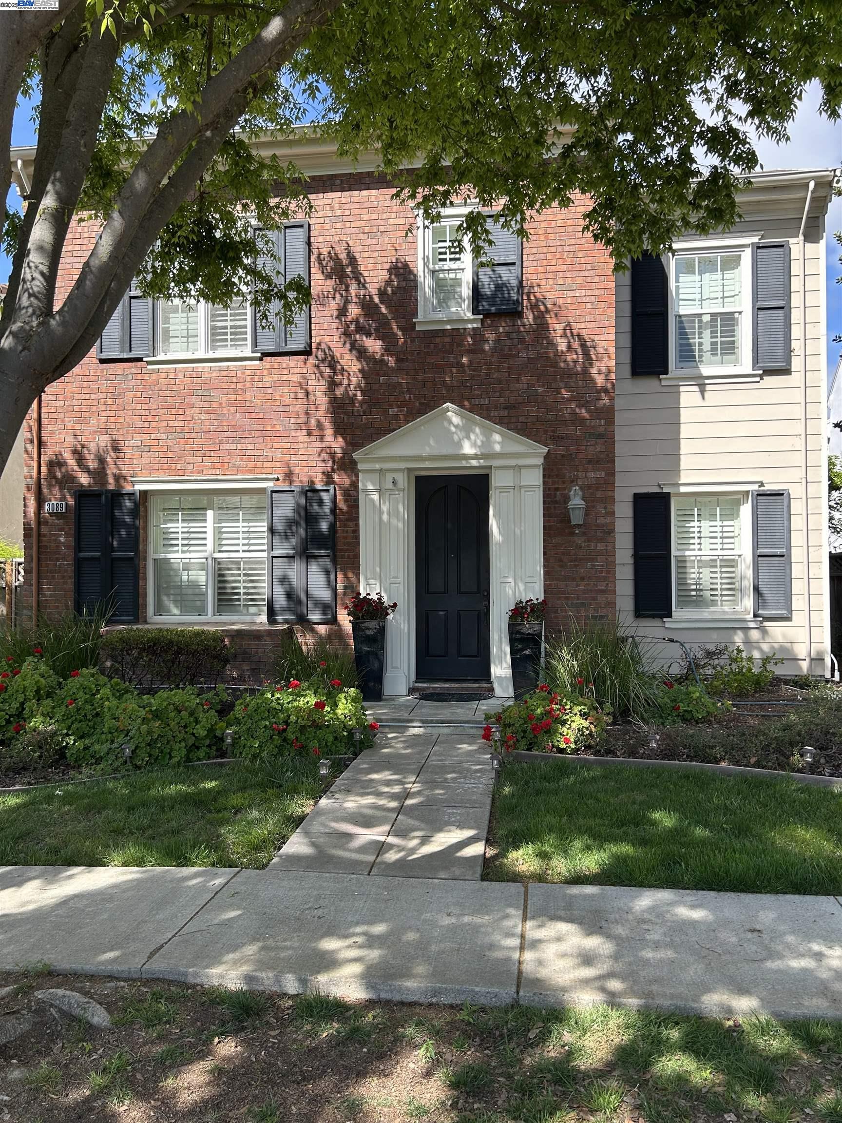 3089 Sweetviolet Drive, Unit B San Ramon, CA 94582 - Photo 1 of 13 a front view of a house with garden