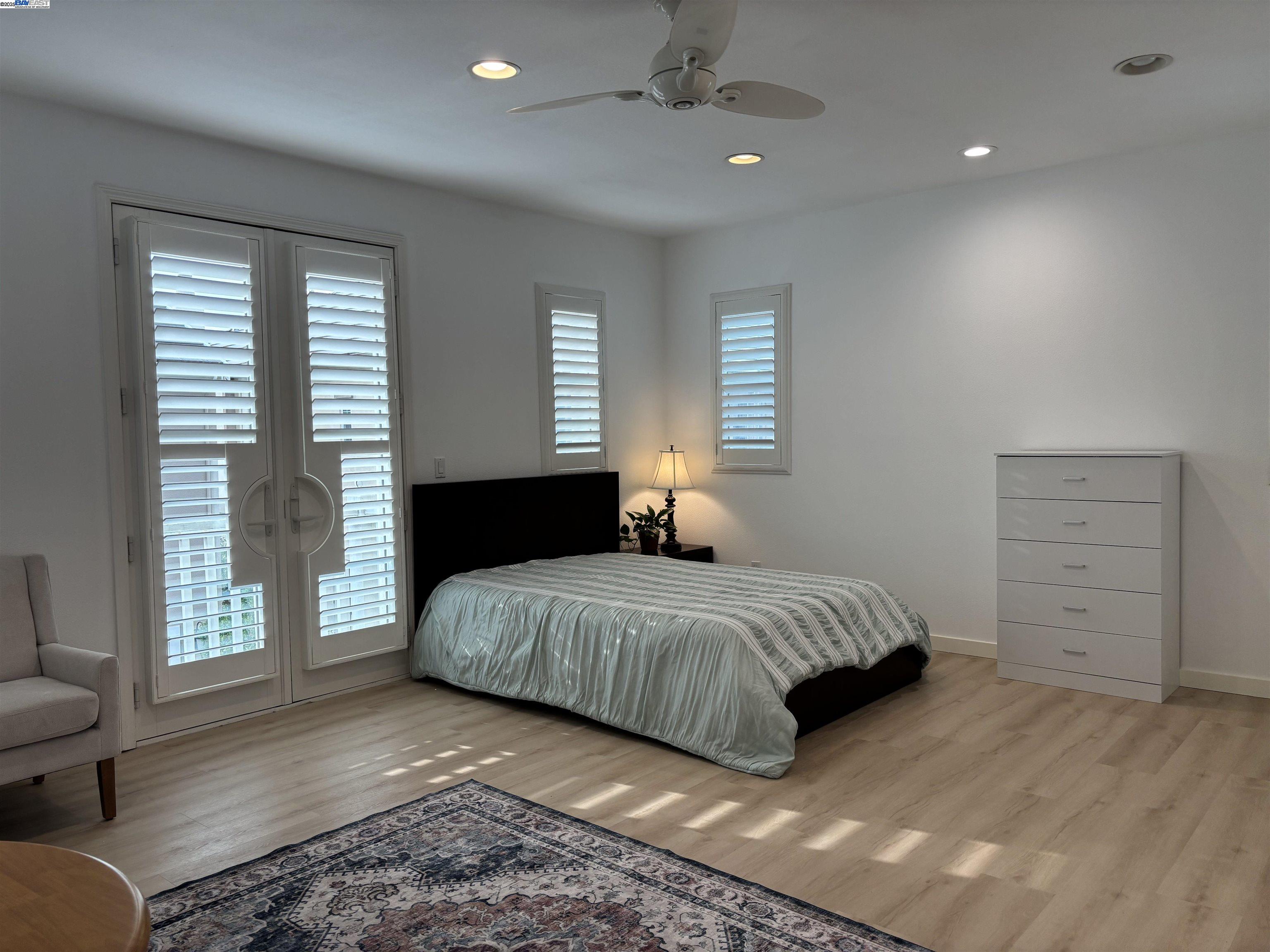 3089 Sweetviolet Drive, Unit B San Ramon, CA 94582 - Photo 11 of 13 a bedroom with a bed and a dresser