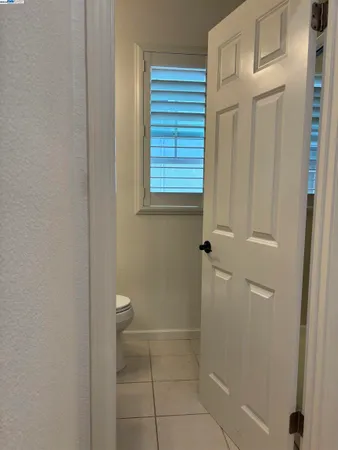 a bathroom that has a window in it