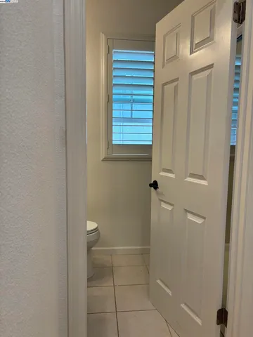 a bathroom that has a window in it