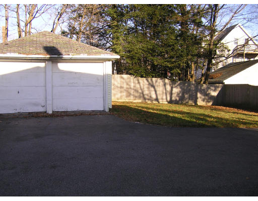 26-28 Harding Road Norwood, MA 02062 - Photo 6 of 6 a view of back yard of the house and trees