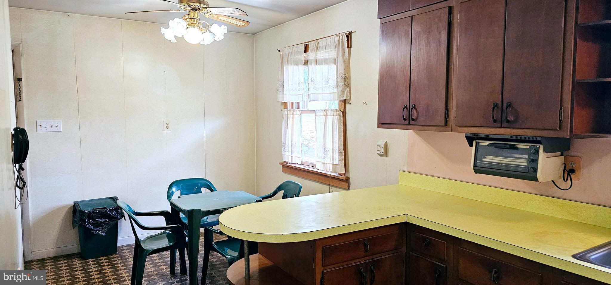 10 Beavens Road Reading, PA 19608 - Photo 8 of 28 a view of a dining room with furniture and chandelier