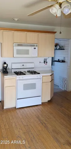 a kitchen with a stove and a sink