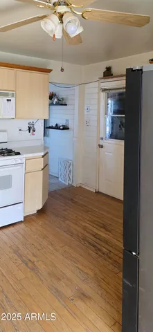 a bathroom with a sink a mirror and a shower