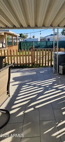 a view of a wooden fence