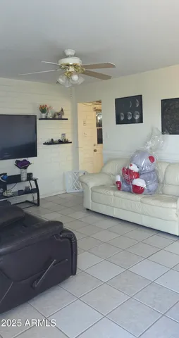 a bedroom with a bed and dresser