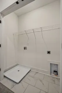 a view of a room with racks on the wall