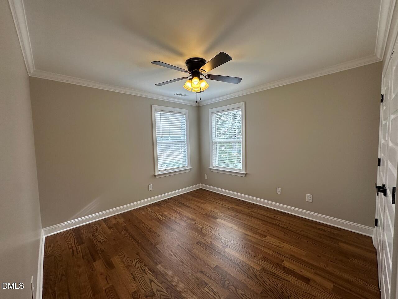 913 Clayton Road Benson, NC 27504 - Photo 25 of 35 a view of room with window ceiling fan and hardwood floor