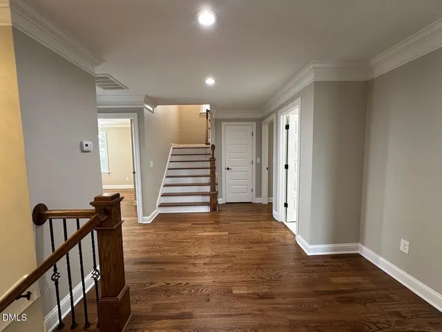 a view of entryway with wooden floor