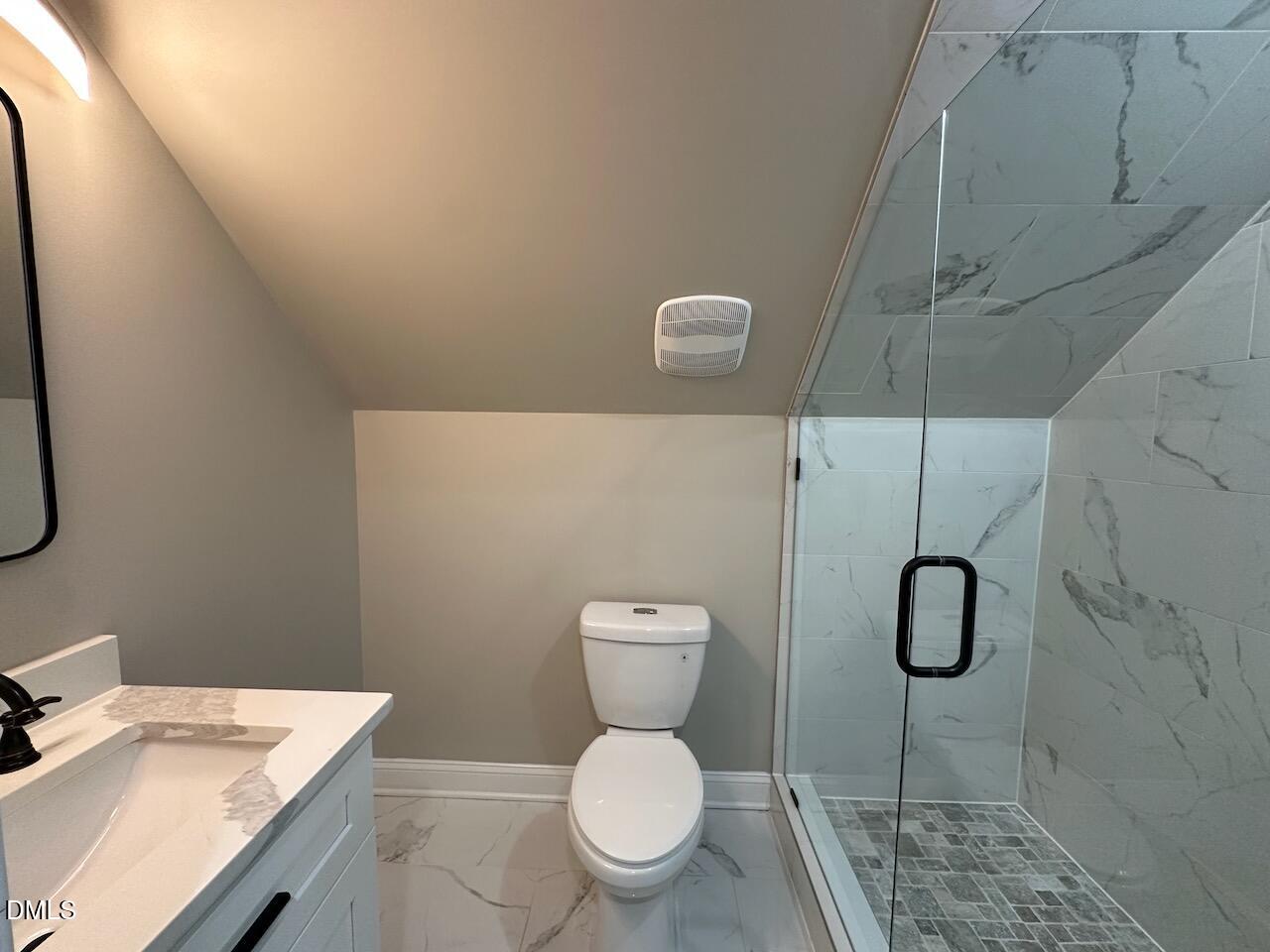 913 Clayton Road Benson, NC 27504 - Photo 31 of 35 a bathroom with a toilet and a sink