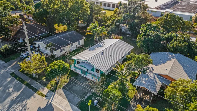 a view of washer and dryer with kitchen in the background
