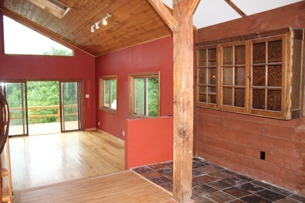 331 Adamsville Road Colrain, MA 01340 - Photo 6 of 30 a view of an entryway with a floor to ceiling window