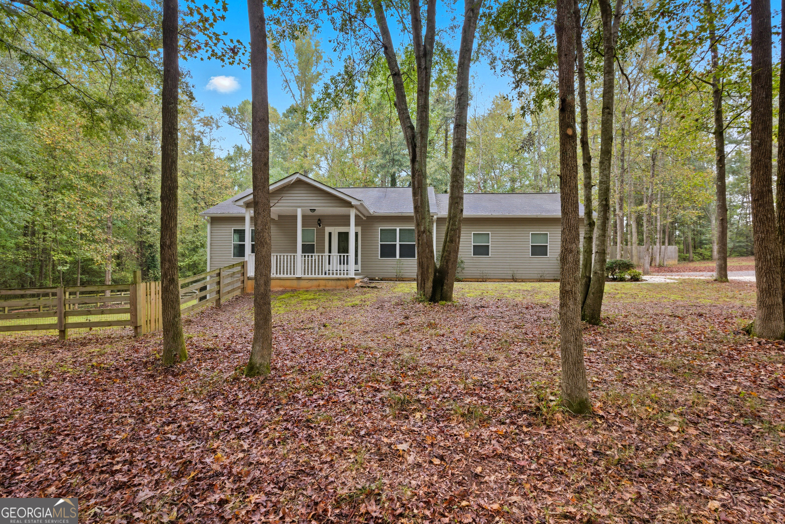 a house view with a garden space