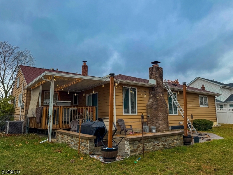 617 Sycamore Street Paramus, NJ 07652 - Photo 18 of 20 a front view of house with yard