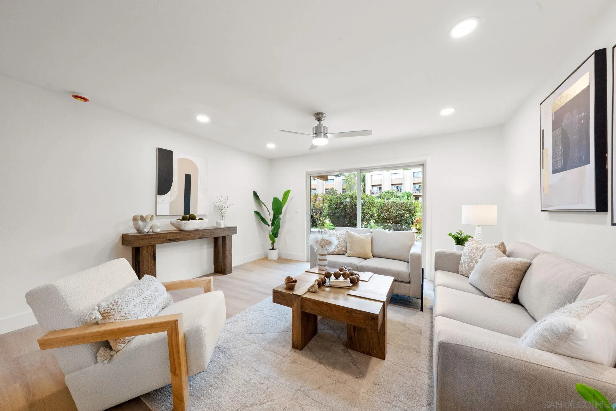 5700 Baltimore Drive La Mesa, CA 91942 - Photo 13 of 37 a living room with furniture and a large window