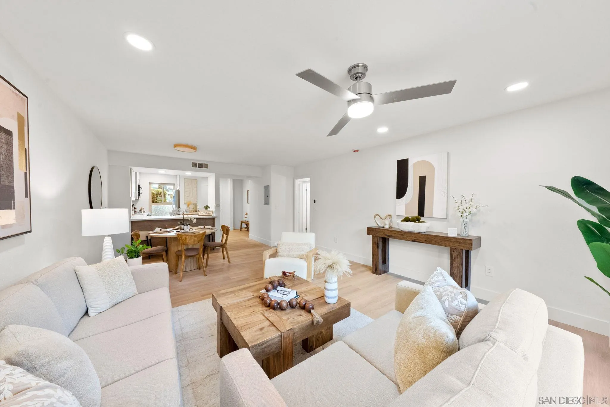 5700 Baltimore Drive La Mesa, CA 91942 - Photo 15 of 37 a living room with furniture and view of kitchen