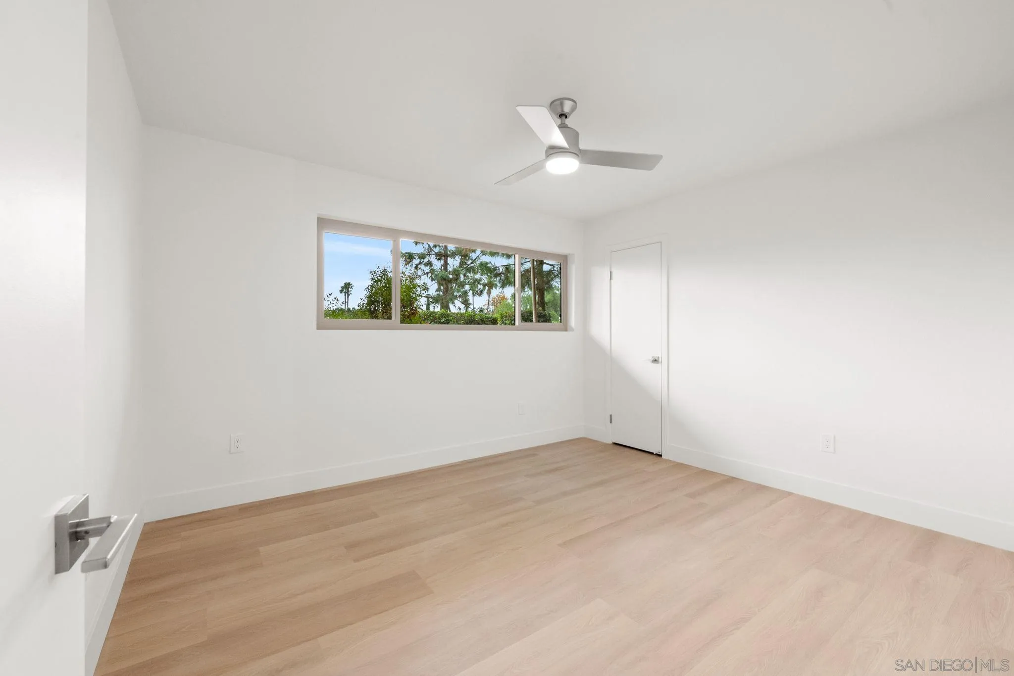 5700 Baltimore Drive La Mesa, CA 91942 - Photo 22 of 37 an empty room with windows