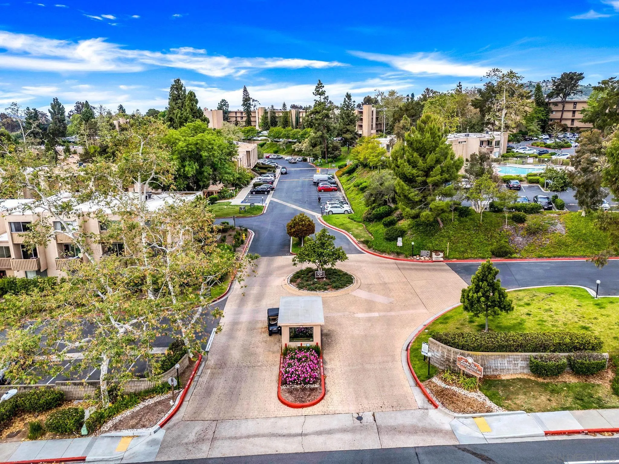 5700 Baltimore Drive La Mesa, CA 91942 - Photo 35 of 37 a view of a swimming pool with outdoor seating and plants