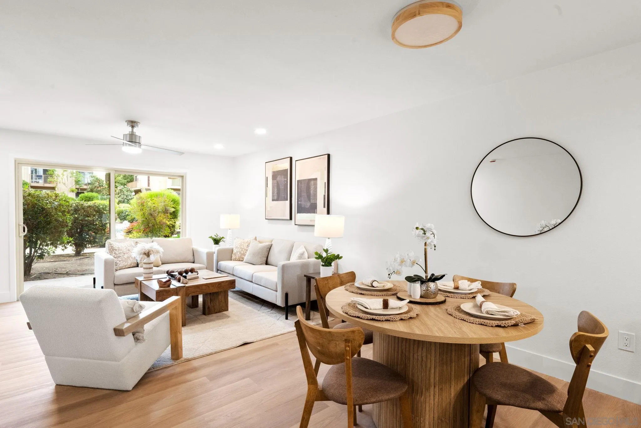 5700 Baltimore Drive La Mesa, CA 91942 - Photo 7 of 37 a living room with furniture a window and a table