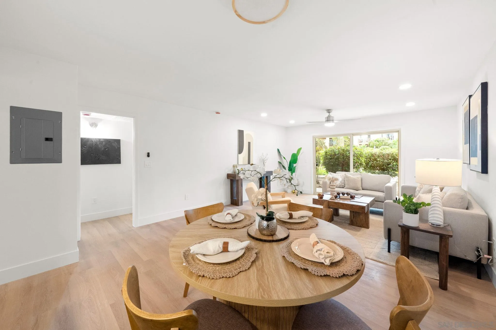 5700 Baltimore Drive La Mesa, CA 91942 - Photo 10 of 37 a view of a dining room with furniture and wooden floor