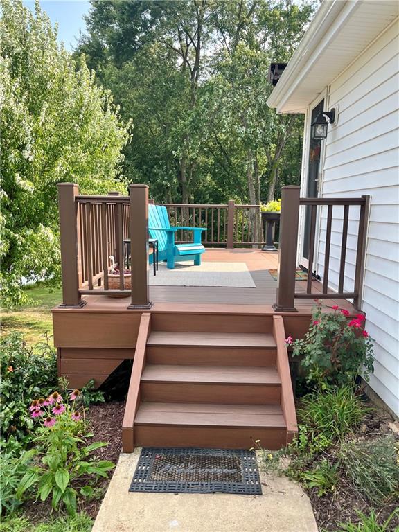 135 Lagonda Road Washington, PA 15301 - Photo 13 of 25 a view of backyard with seating space and wooden fence