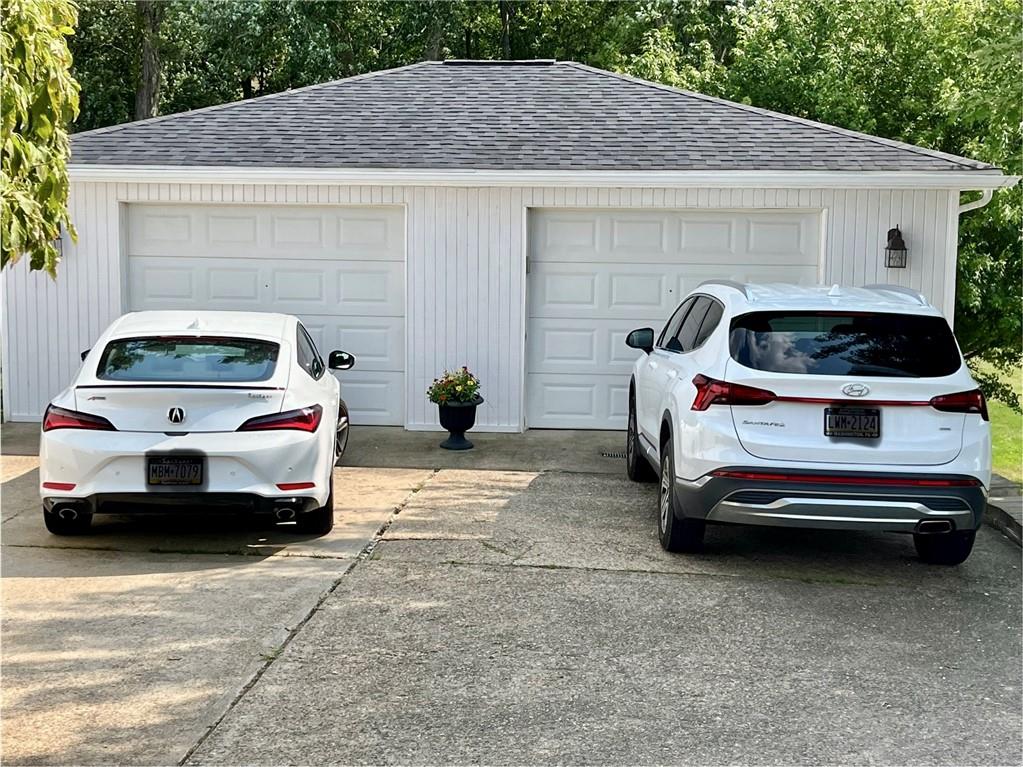 135 Lagonda Road Washington, PA 15301 - Photo 6 of 25 a car parked in front of house