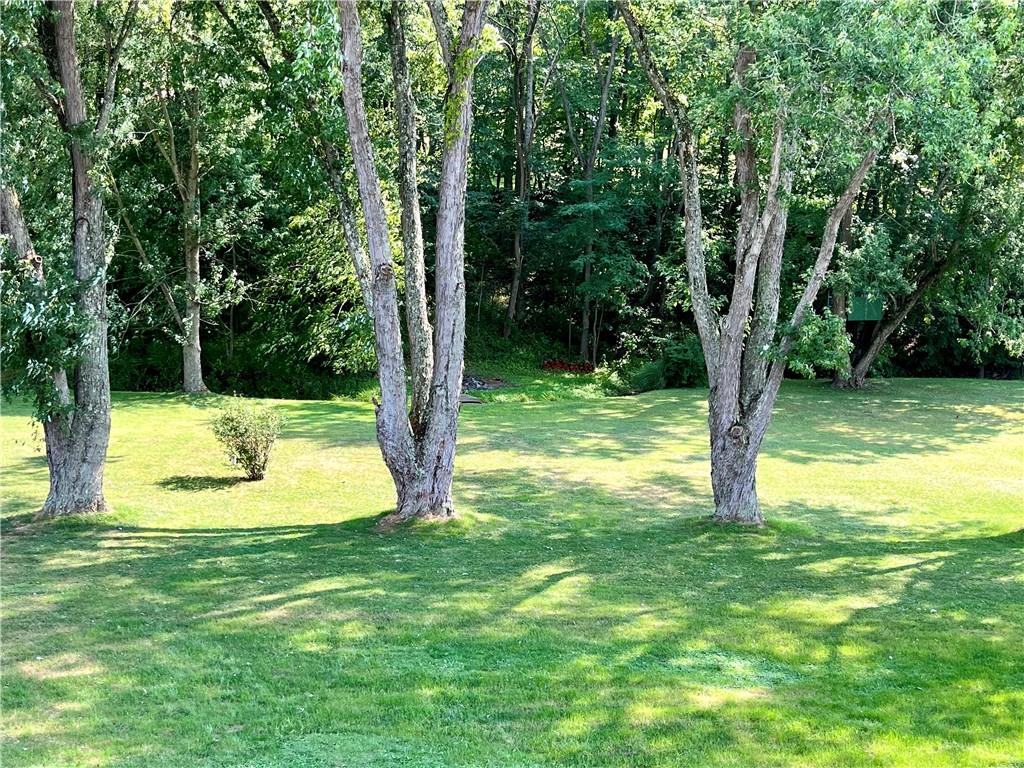135 Lagonda Road Washington, PA 15301 - Photo 7 of 25 a view of a white house with a small yard and swimming pool