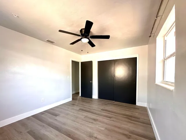 a view of an empty room and window