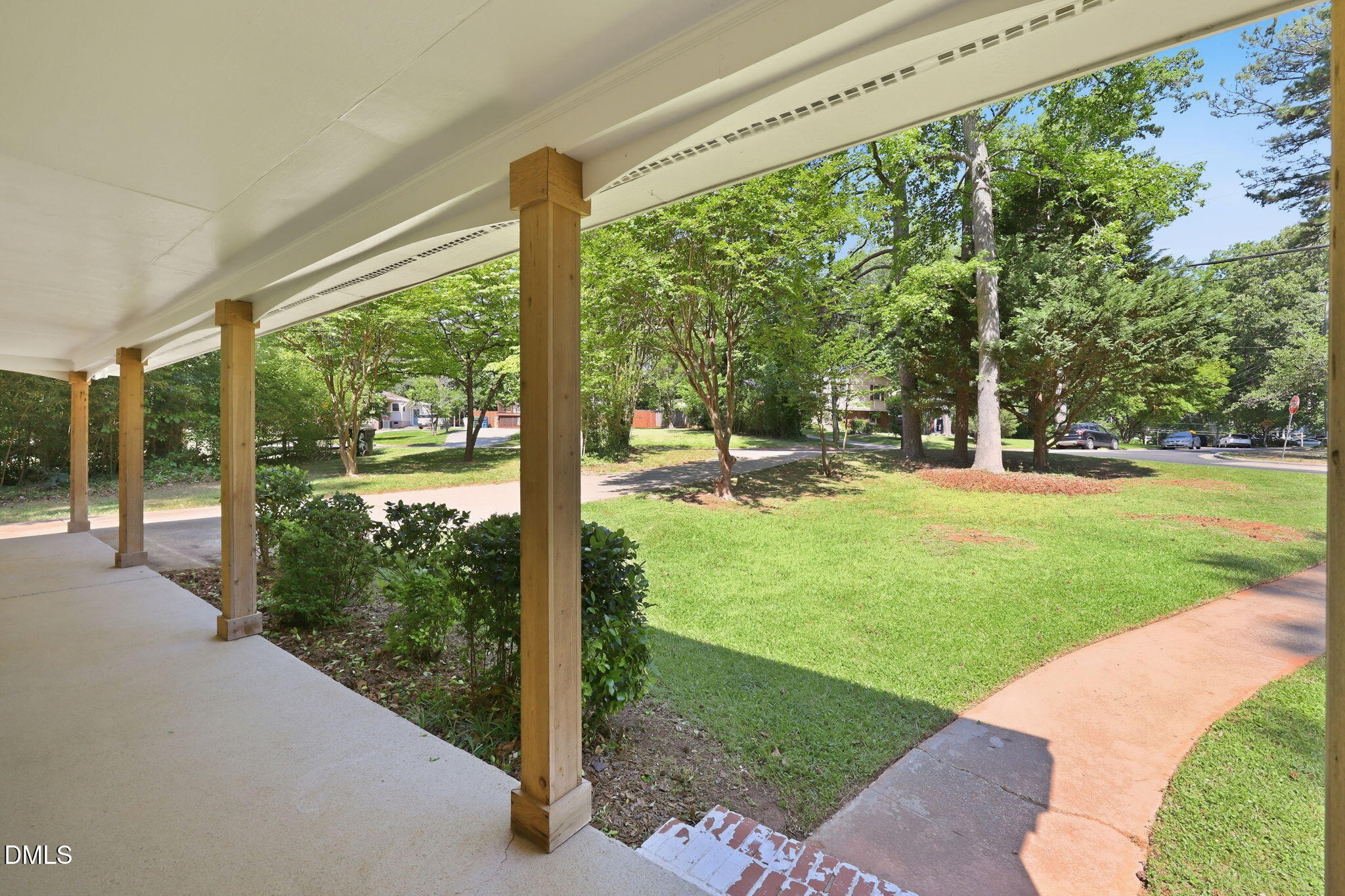 2950 Glenridge Drive Raleigh, NC 27604 - Photo 6 of 53 a view of a tall trees with a big yard