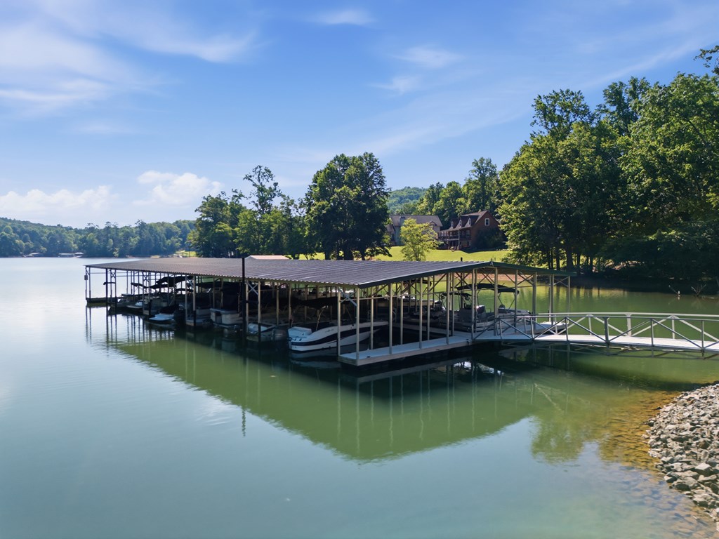 2143 Ridgecrest Circle, Unit 1 Hiawassee, GA 30546 - Photo 10 of 53 a view of a lake with boats and trees in the background
