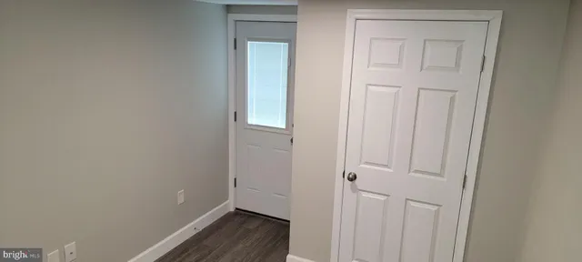 a view of small space with wooden floor