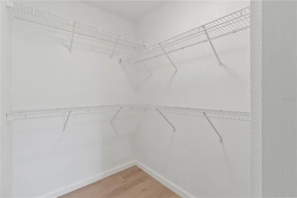 a view of a room with racks on the wall