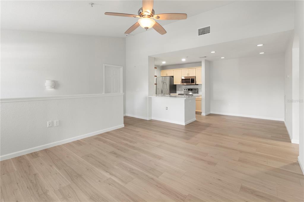 8827 Manor Loop, Unit 201 Lakewood Ranch, FL 34202 - Photo 25 of 39 a view of a kitchen with a sink and a window
