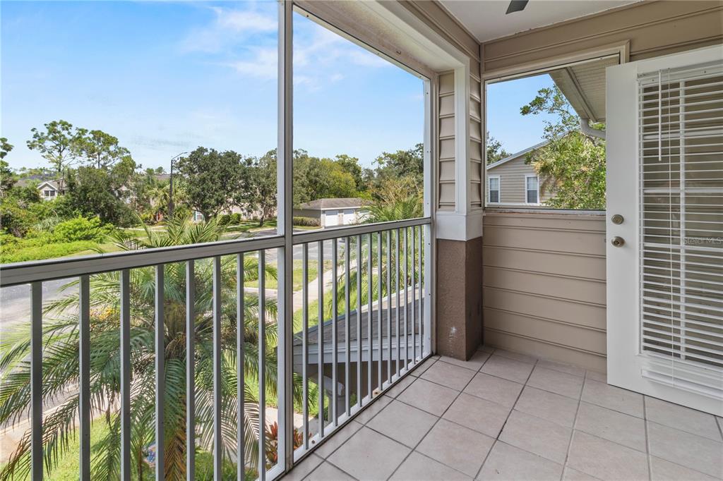 8827 Manor Loop, Unit 201 Lakewood Ranch, FL 34202 - Photo 10 of 39 a view of a balcony with an outdoor space