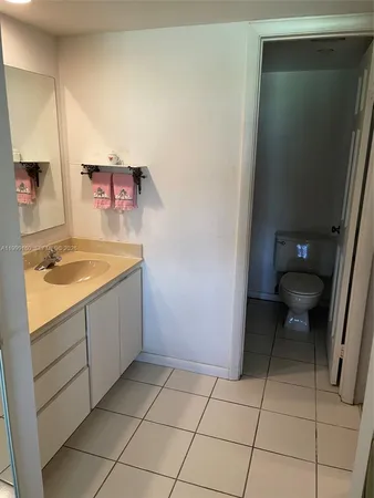 a bathroom with a sink and a toilet