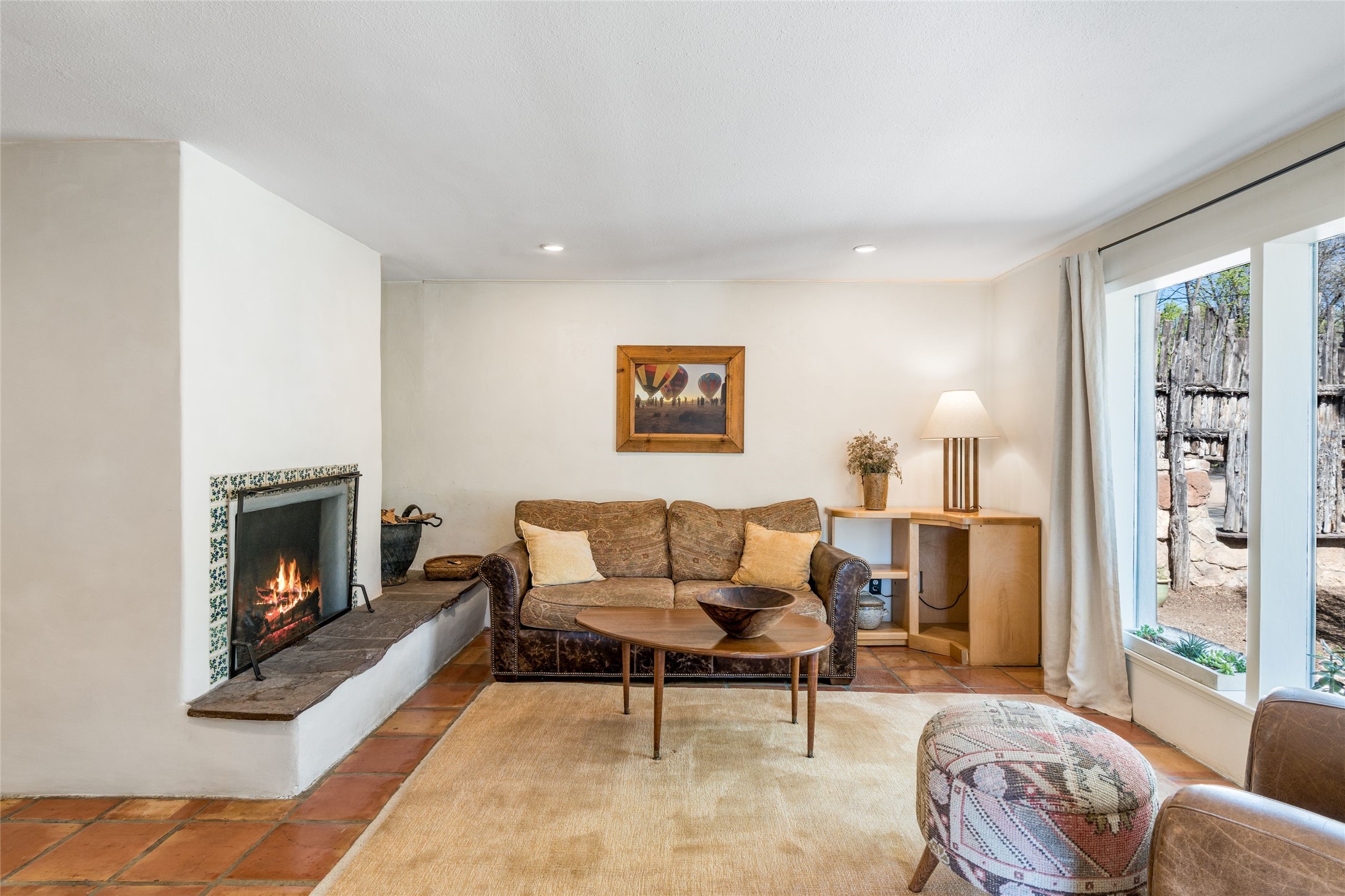 1402 Bishops Lodge Road, Unit A Santa Fe, NM 87506 - Photo 8 of 40 Living Room w/ Two Sided Fireplace