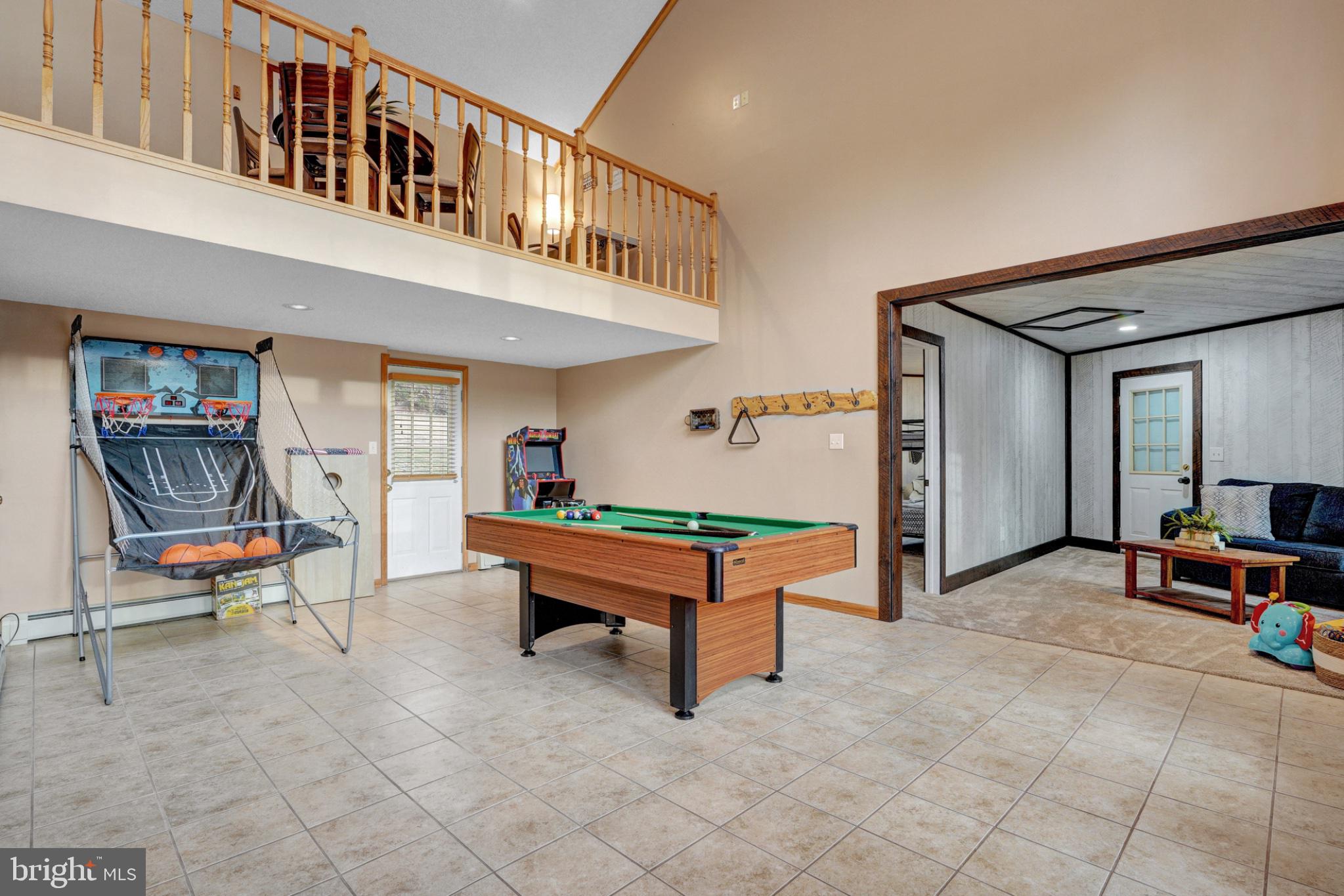 259 A A-Frame Road Coudersport, PA 16915 - Photo 44 of 130 Spacious game room with lofted charm.