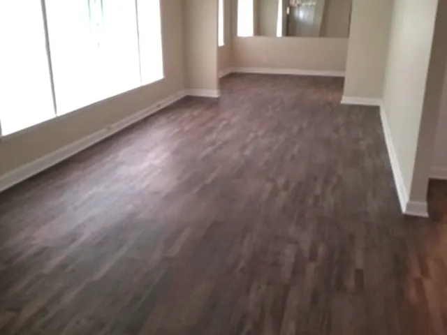 a view of an empty room and window